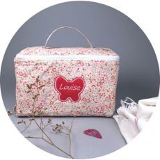 trousse-de-toilette-bebe-fleuri-rose